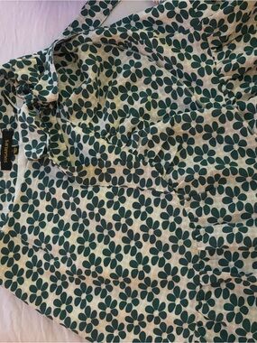 Lush Cream Mini Skirt with Green Floral Print